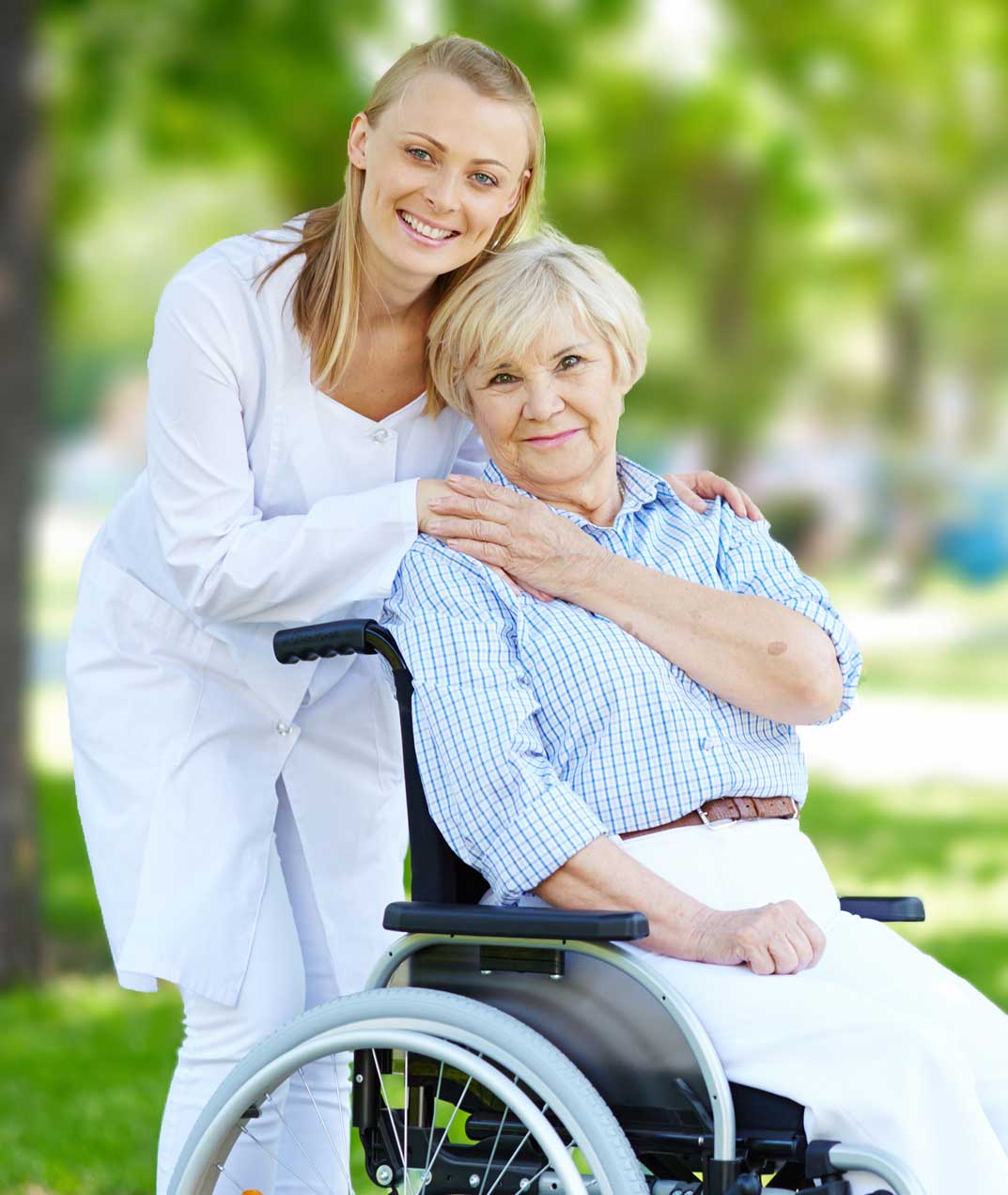 A caring healthcare assistant supporting a smiling grandma in a     wheelchair, providing compassionate domiciliary care services